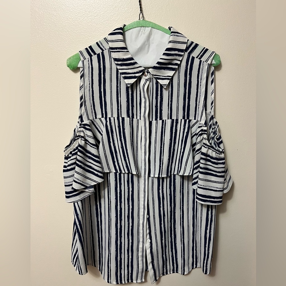 Super cute blue and white striped top. Size L.  Fun sleeves.